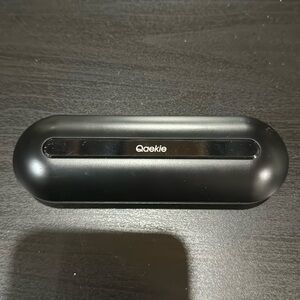 NEW LOWER PRICE:  Qaekie open ear headphones. Missing charging cord with case